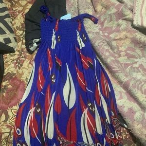 Summer dress or top. Stretchy around cheat area. Brand new, never worn.